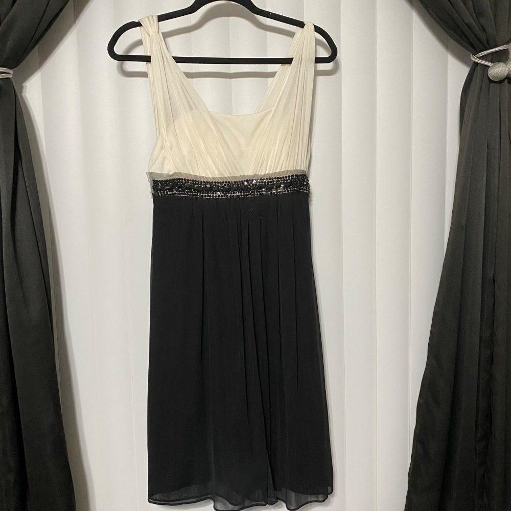Jessica Howard creame rusch top blaxk bottom to fit and flare dress